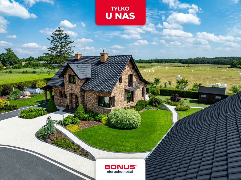 Przepiękny dom z garażami ogrodem i sadem (1)