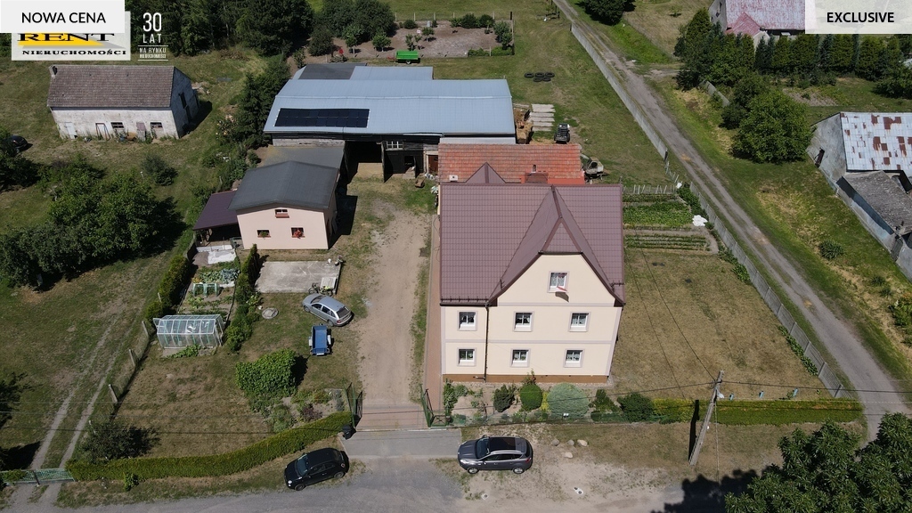 Solidny  duży dom  w otoczeniu bujnej zieleni ! (1)