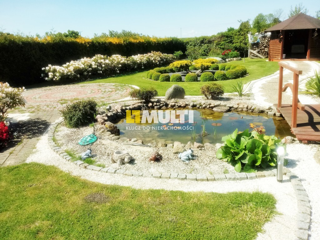 Dom 2 rodzinny z pięknym ogrodem. (14)