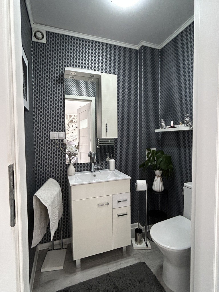 Dwupoziomowy apartament będący namiastką domu. (12)