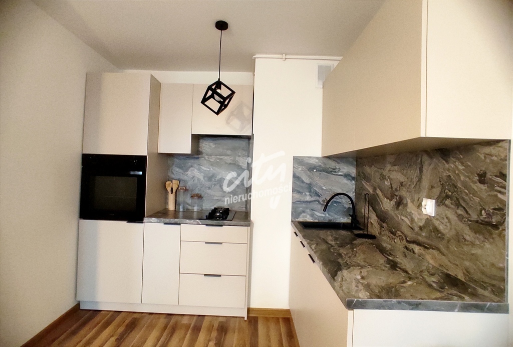 Wyremont. kawalerka z Najemcą - inwestycja,2 windy (5)