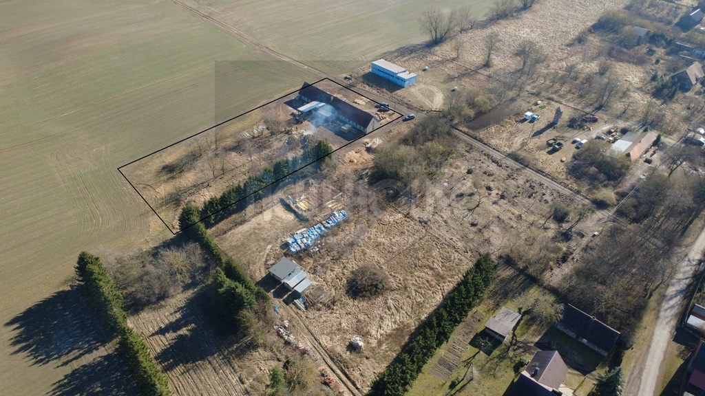 Duża działka rolna zabudowana budynkiem (4)