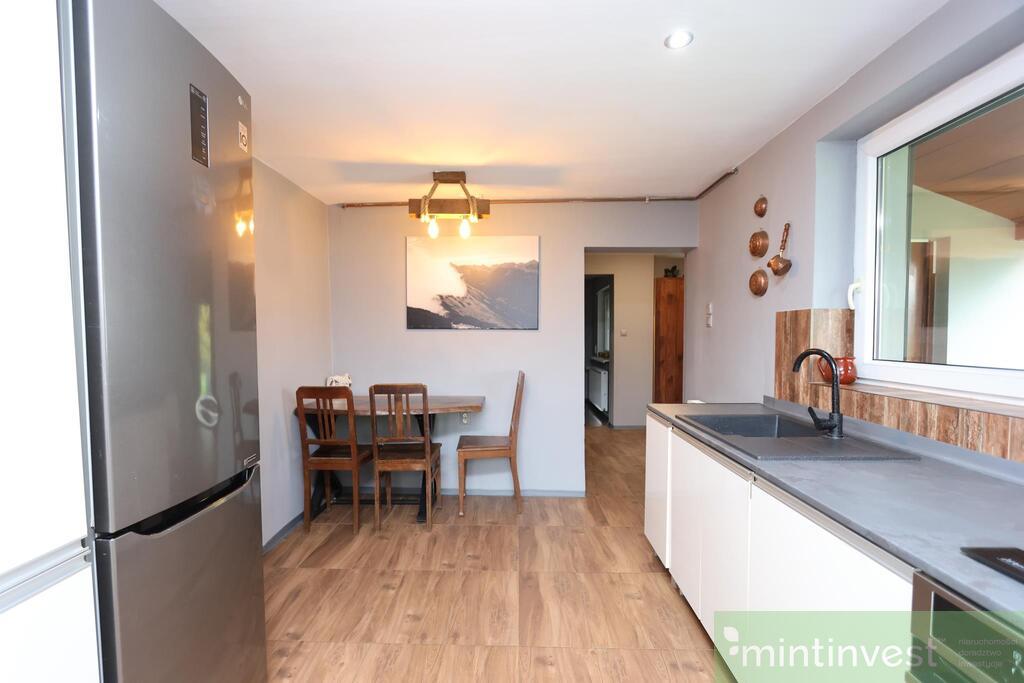 DOM PARTEROWY Z BUD. GOSPODARCZO-GARAŻOWYM (10)