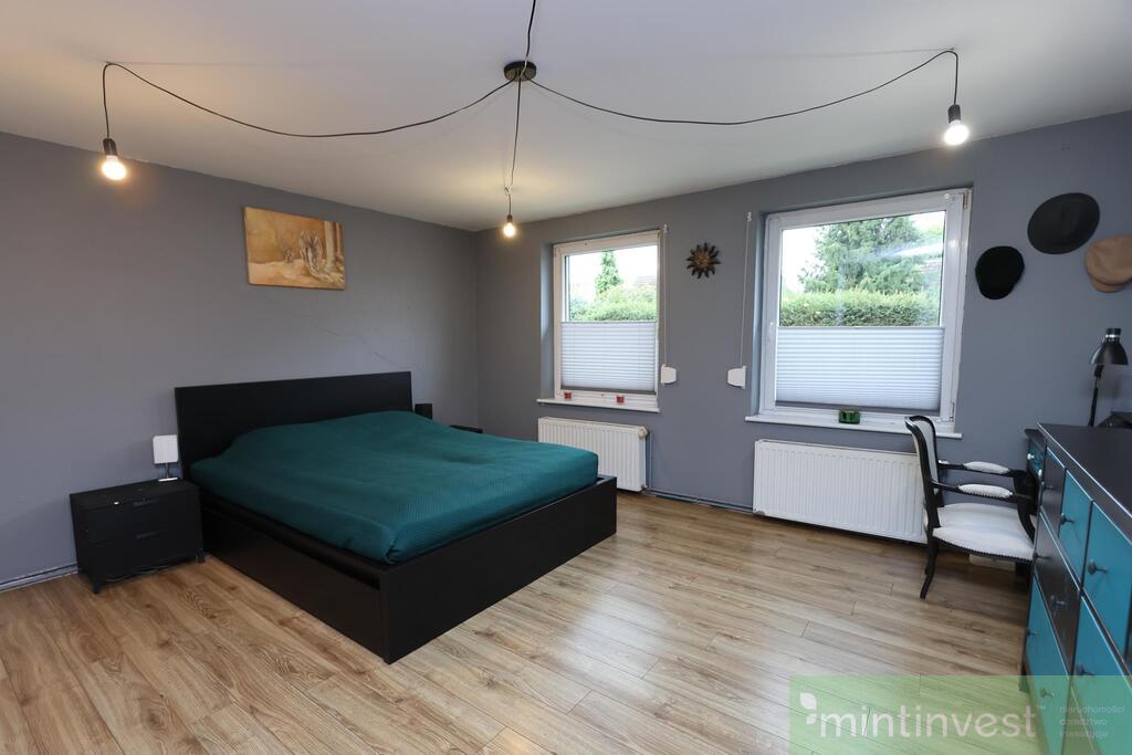 DOM PARTEROWY Z BUD. GOSPODARCZO-GARAŻOWYM (11)