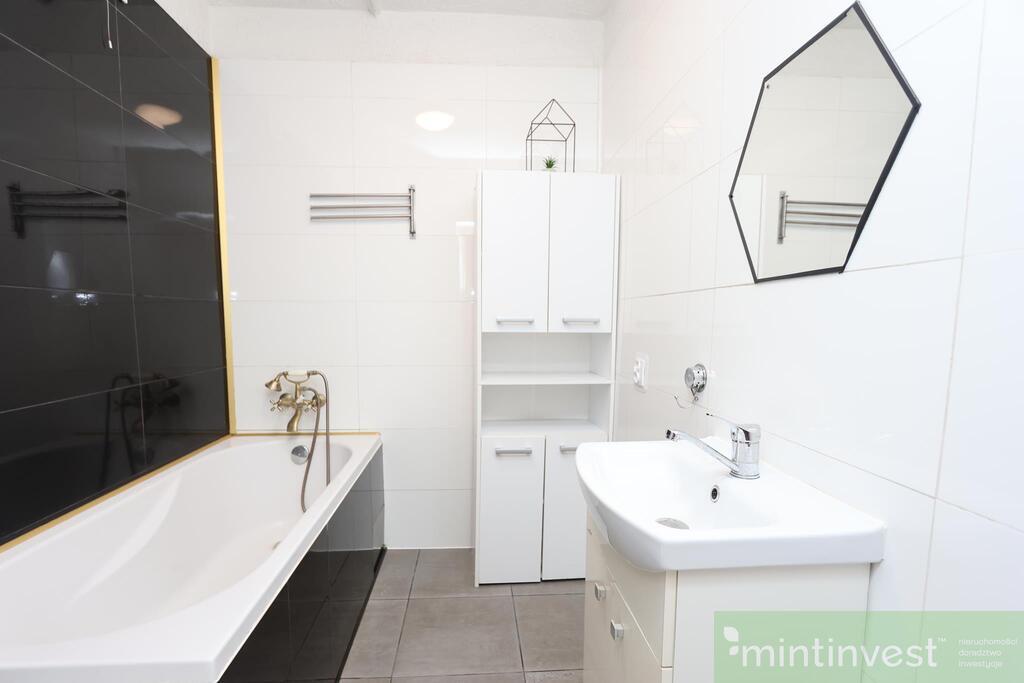 DOM PARTEROWY Z BUD. GOSPODARCZO-GARAŻOWYM (14)