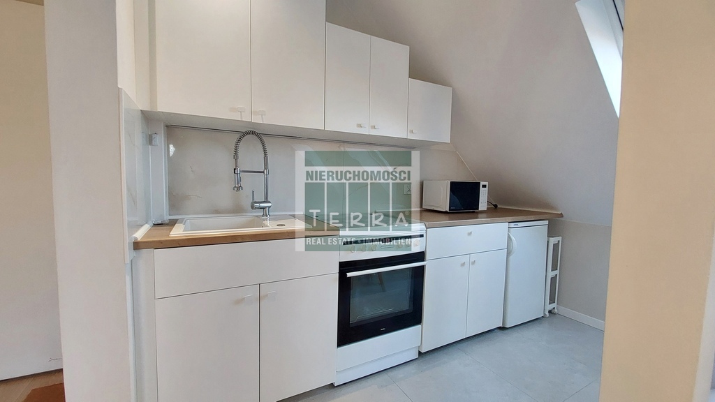 Przytulna kawalerka z sypialnią (14)