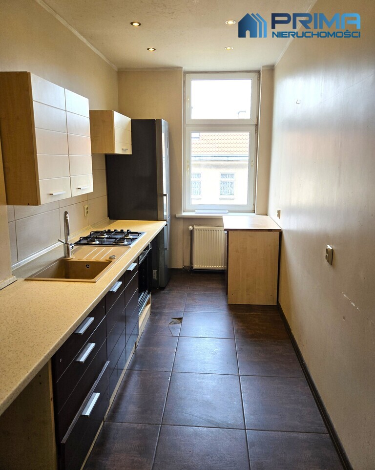 Przestronne 3 pokoje w kamienicy-ogrzewanie gazowe (2)