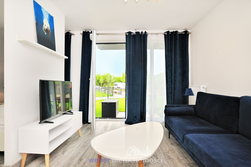 Mieszkanie z ogródkiem i miejscem postojowym (1)