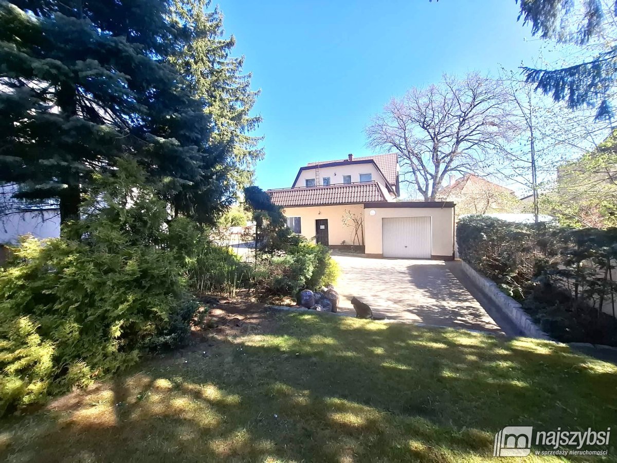 Płoty - dom z lokalem użytkowym +2 garaże (1)