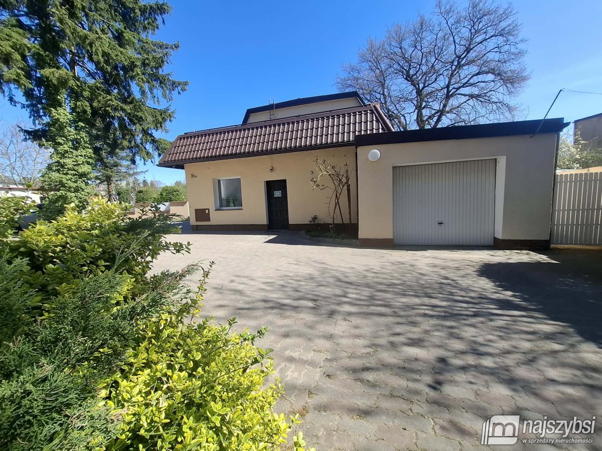 Płoty - dom z lokalem użytkowym +2 garaże (12)