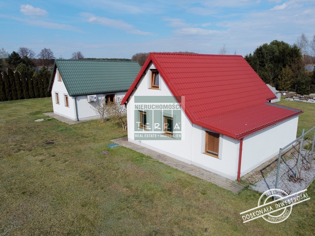 Działka budowlana z domkami nad jeziorem. (2)