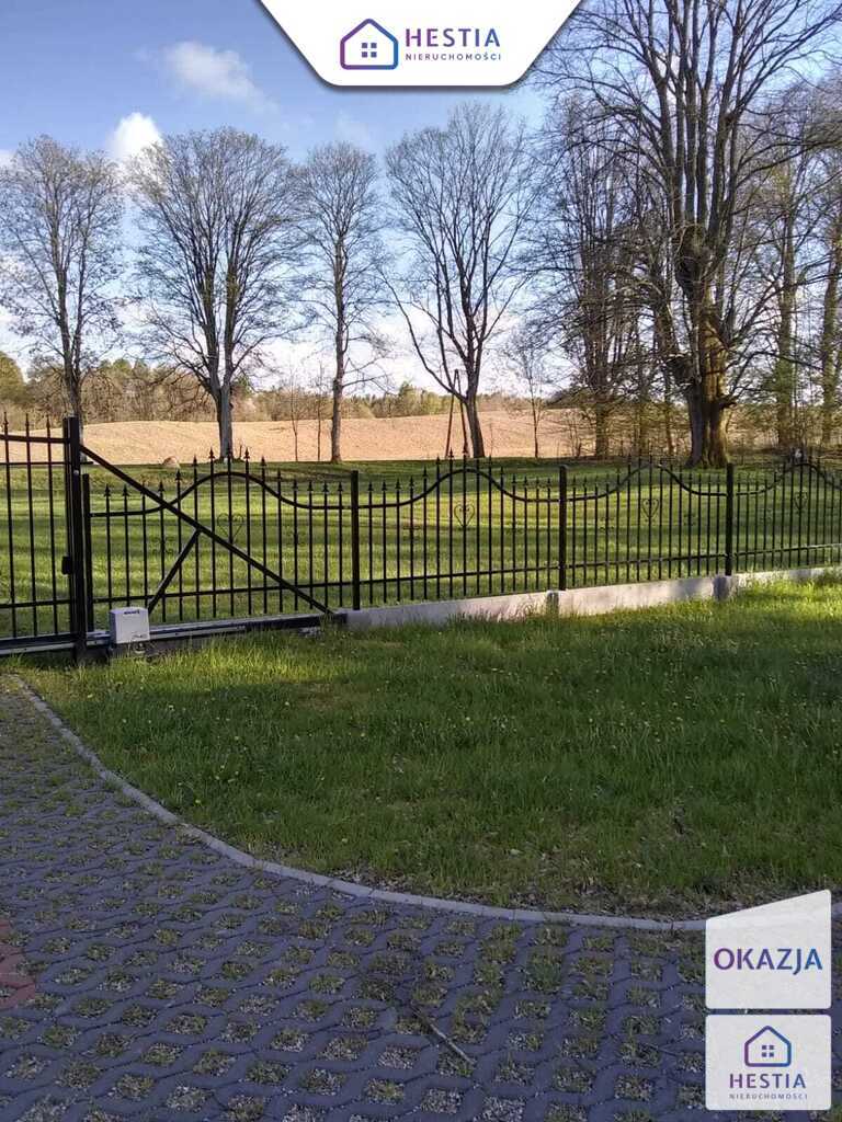Siedlisko z domem z bali i własnym stawem (24)